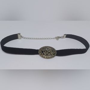 *Claimed* Black velvet choker with metal pendant